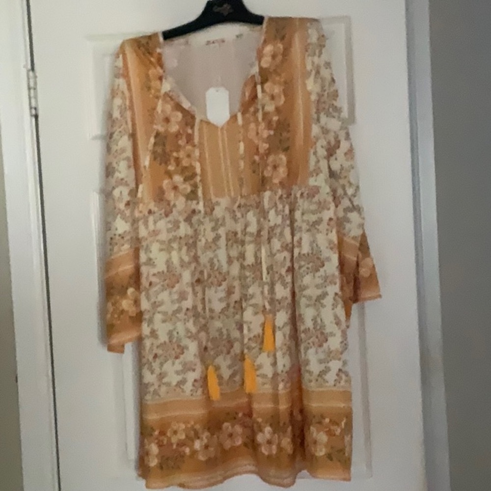Be a Golden Gal in this lovely dress. Perfect for the beach or nite out